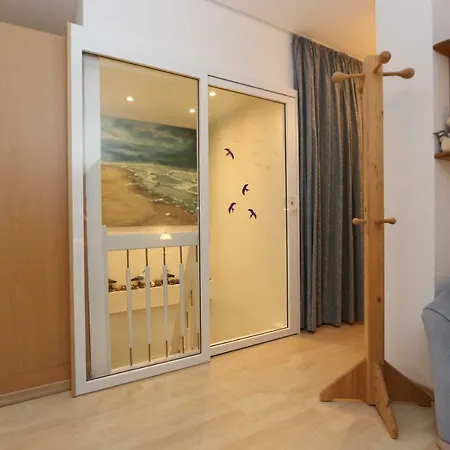 Im Reetdachhaus_ D Apartamento